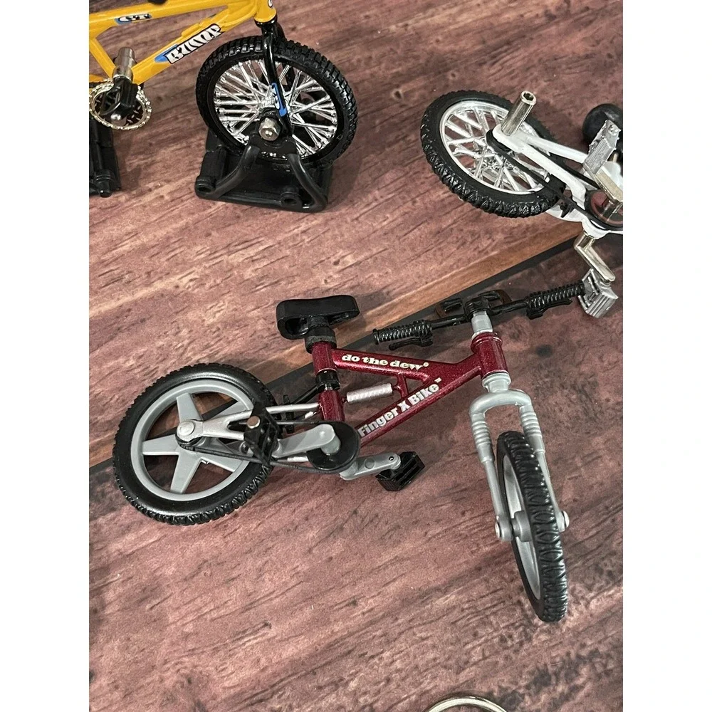 Five Vintage BMX Flick Trix Bike Lot Mix With One Bike Stand And 3 Metal Piece